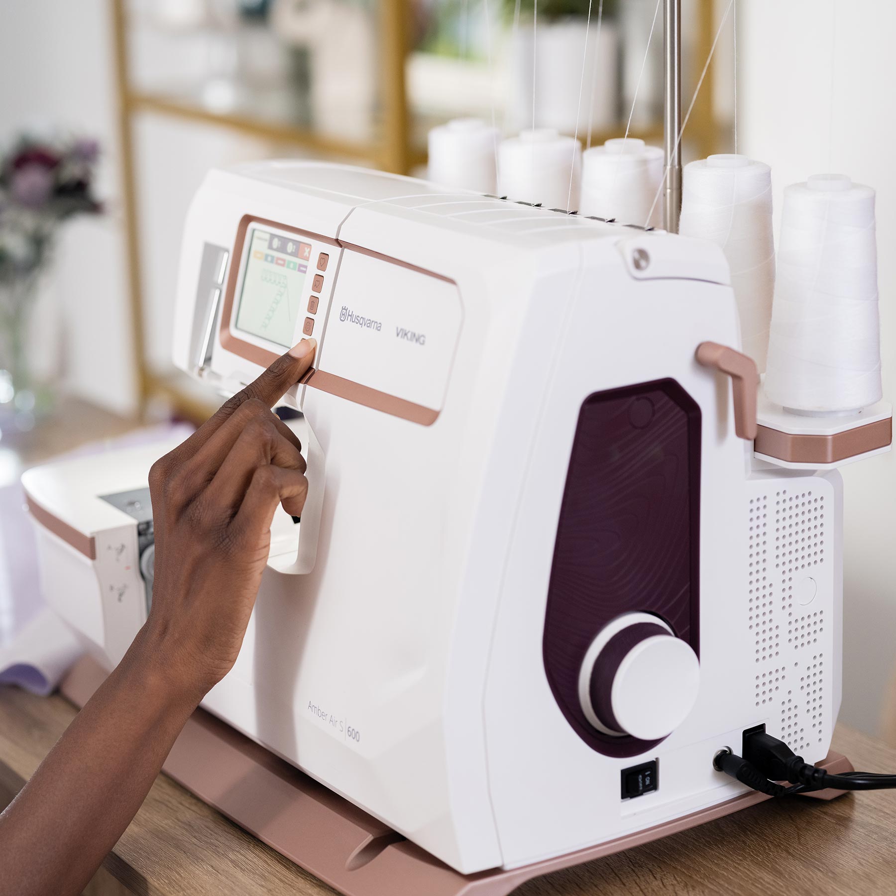 HUSQVARNA® VIKING® AMBER™ Air S | 600 Coverlock Machine - Fashion Fabrics LLC