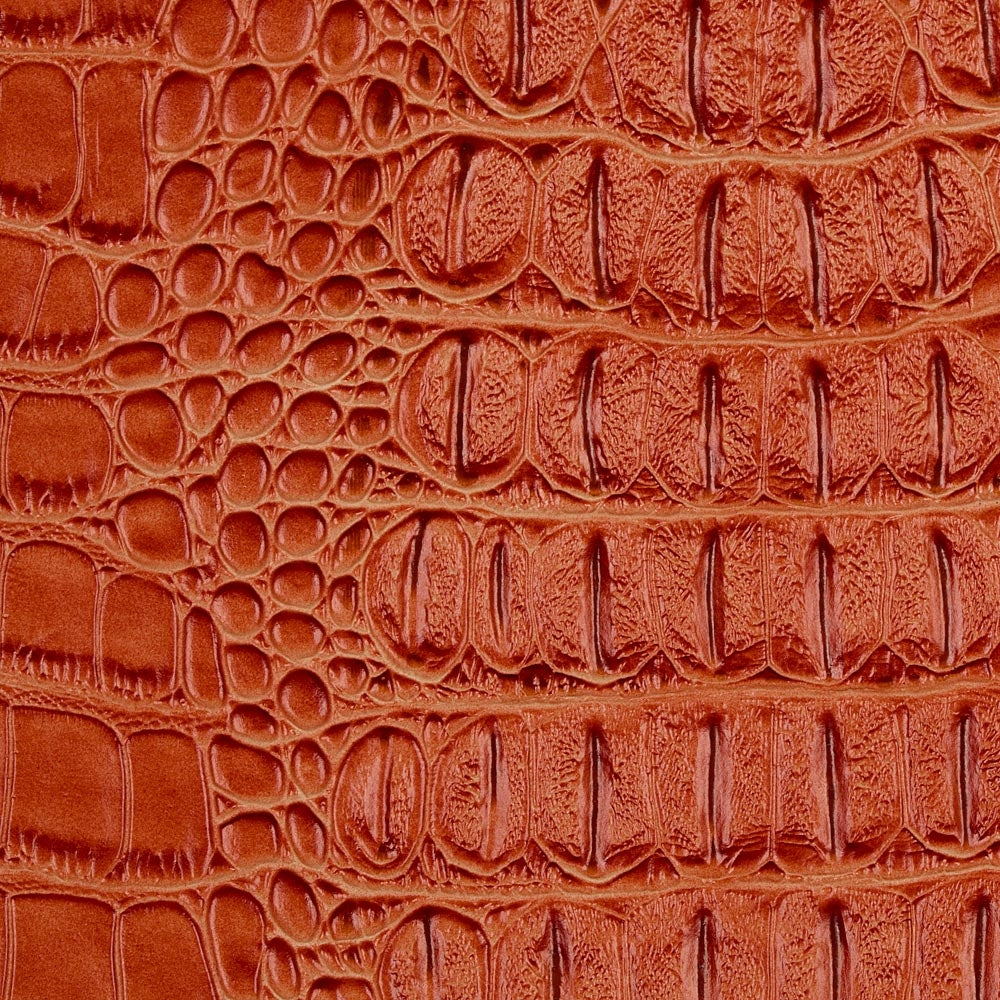 Orange Metallic Gator Vinyl Fabric - Fashion Fabrics Los Angeles