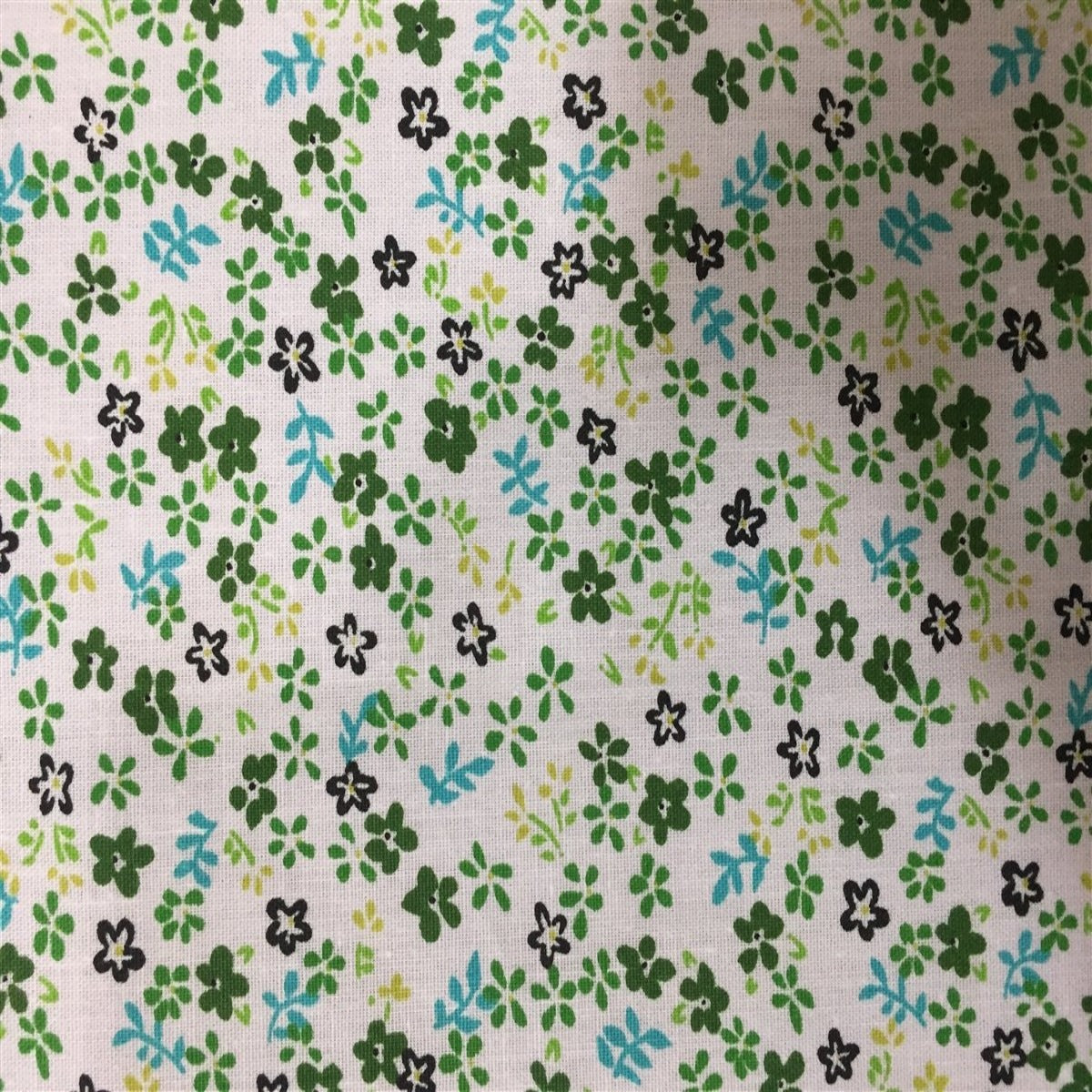 Green Small Floral Print Poly Cotton Fabric - Fashion Fabrics Los Angeles