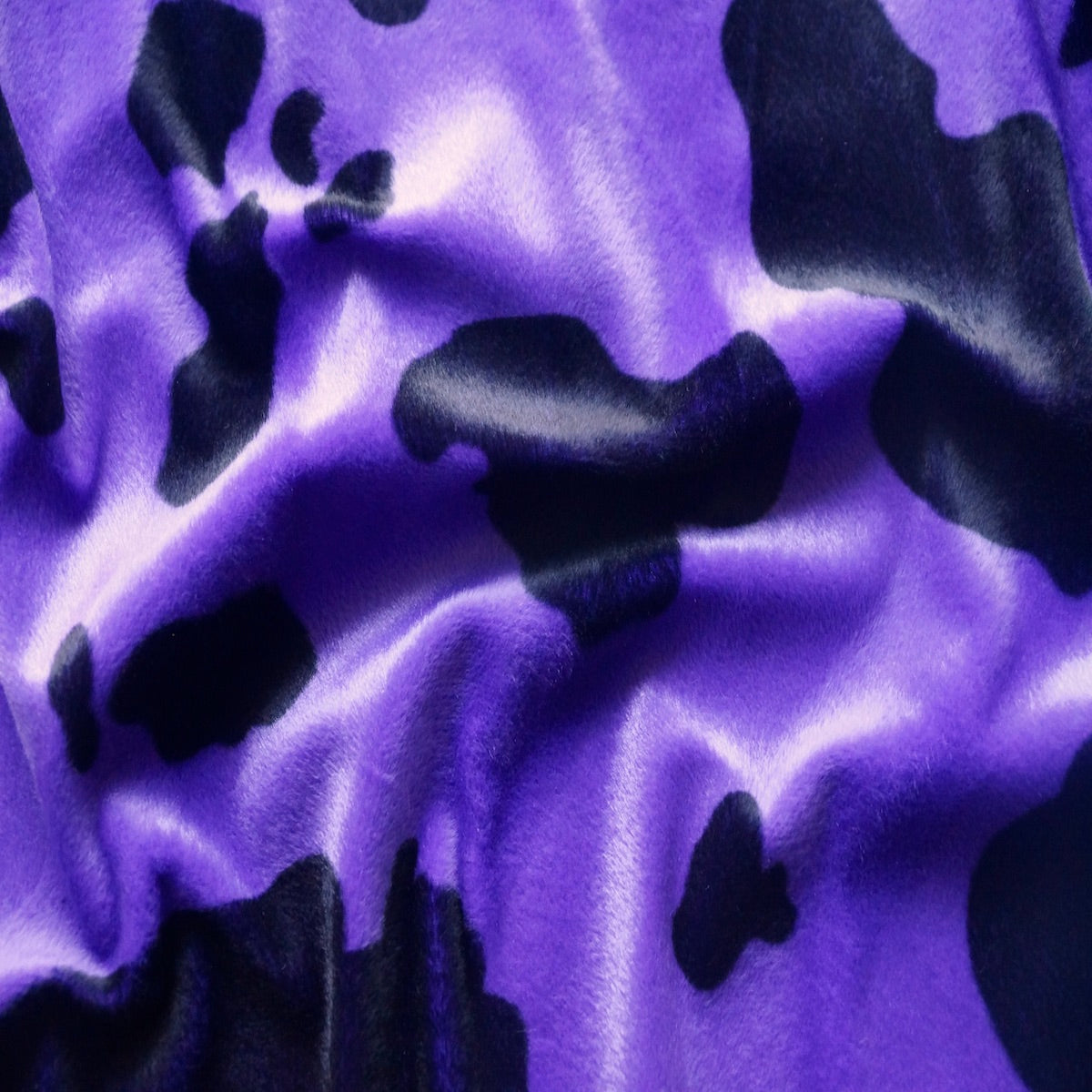 Black Purple Cow Velboa Faux Fur - Fashion Fabrics Los Angeles