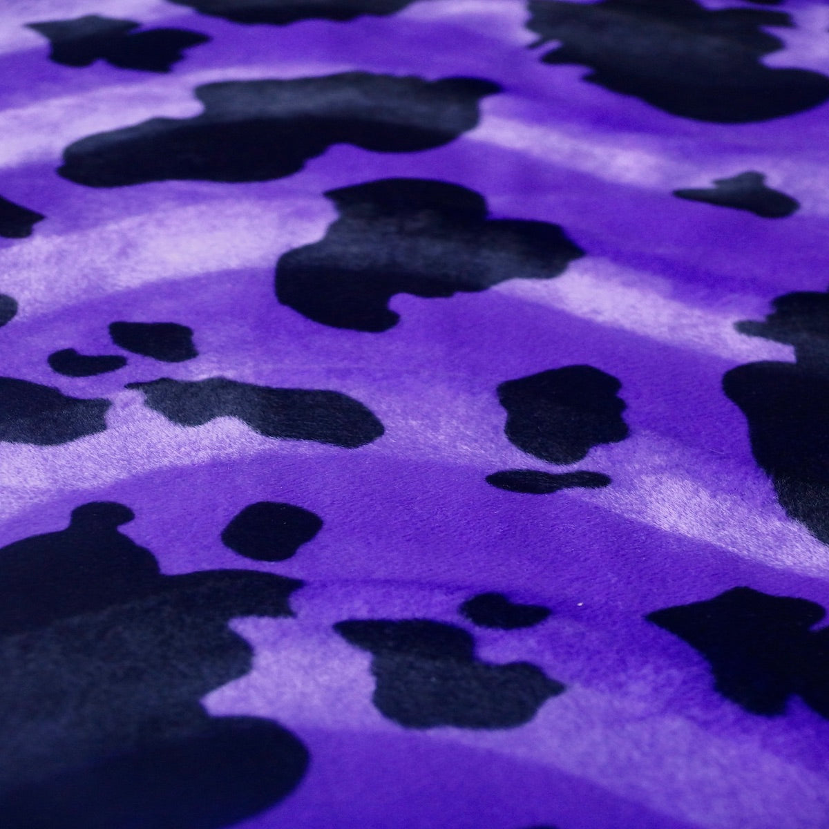 Black Purple Cow Velboa Faux Fur - Fashion Fabrics Los Angeles
