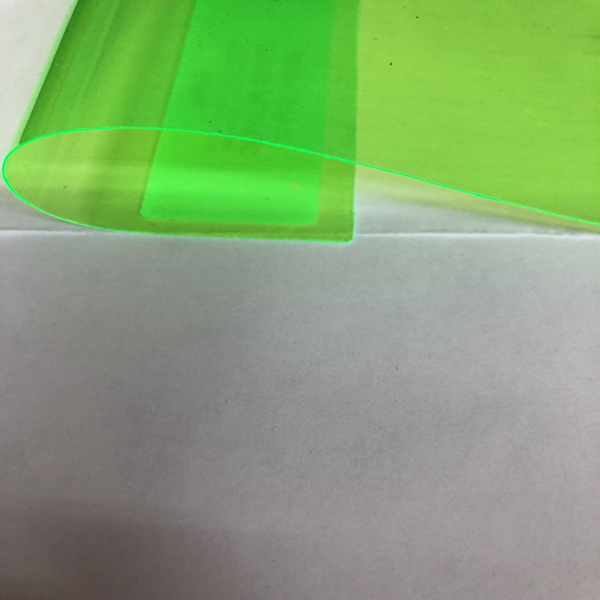 Highlighter Green Marine PVC Tinted Plastic Vinyl Fabric - Fashion Fabrics Los Angeles