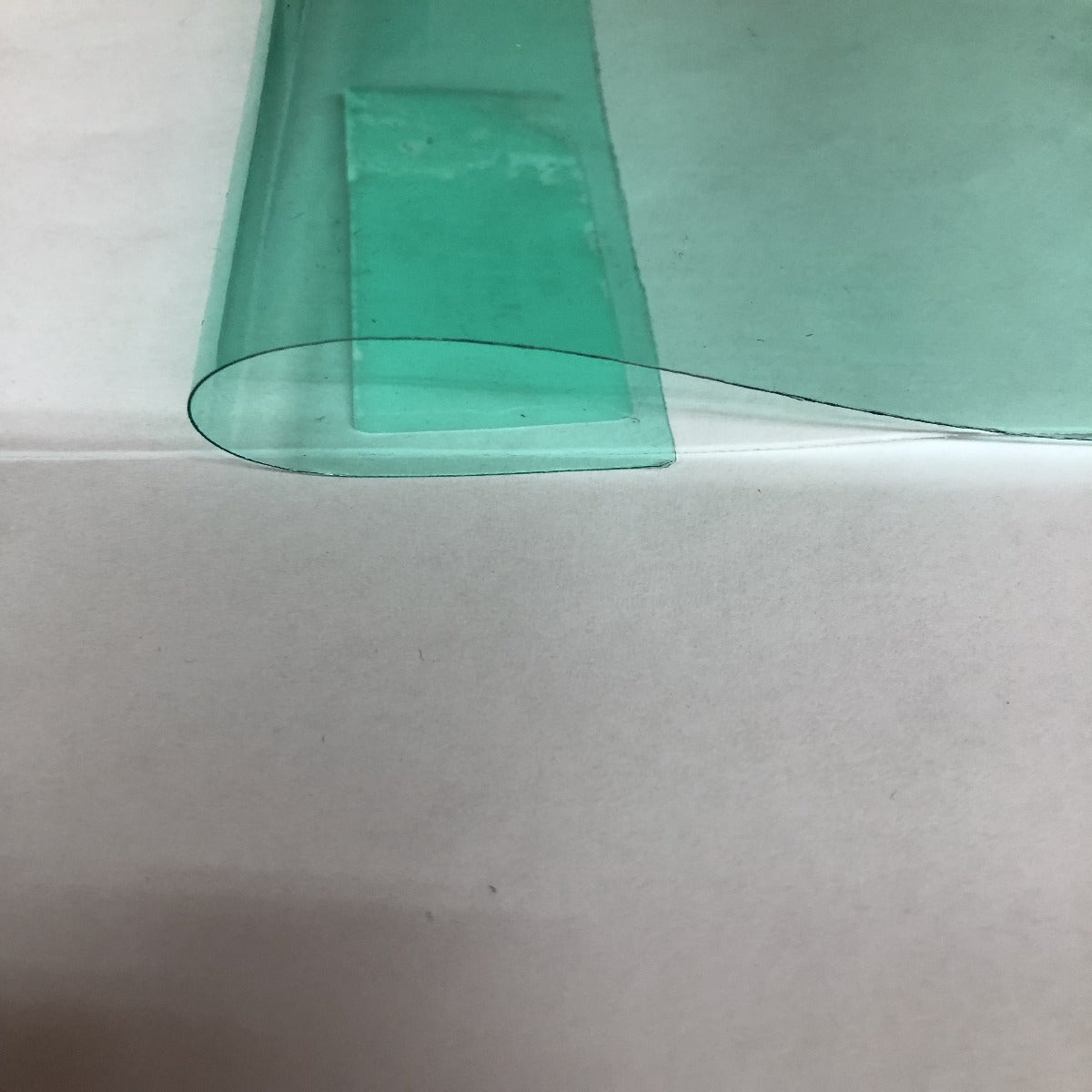 Aqua Marine PVC Tinted Plastic Vinyl Fabric - Fashion Fabrics Los Angeles