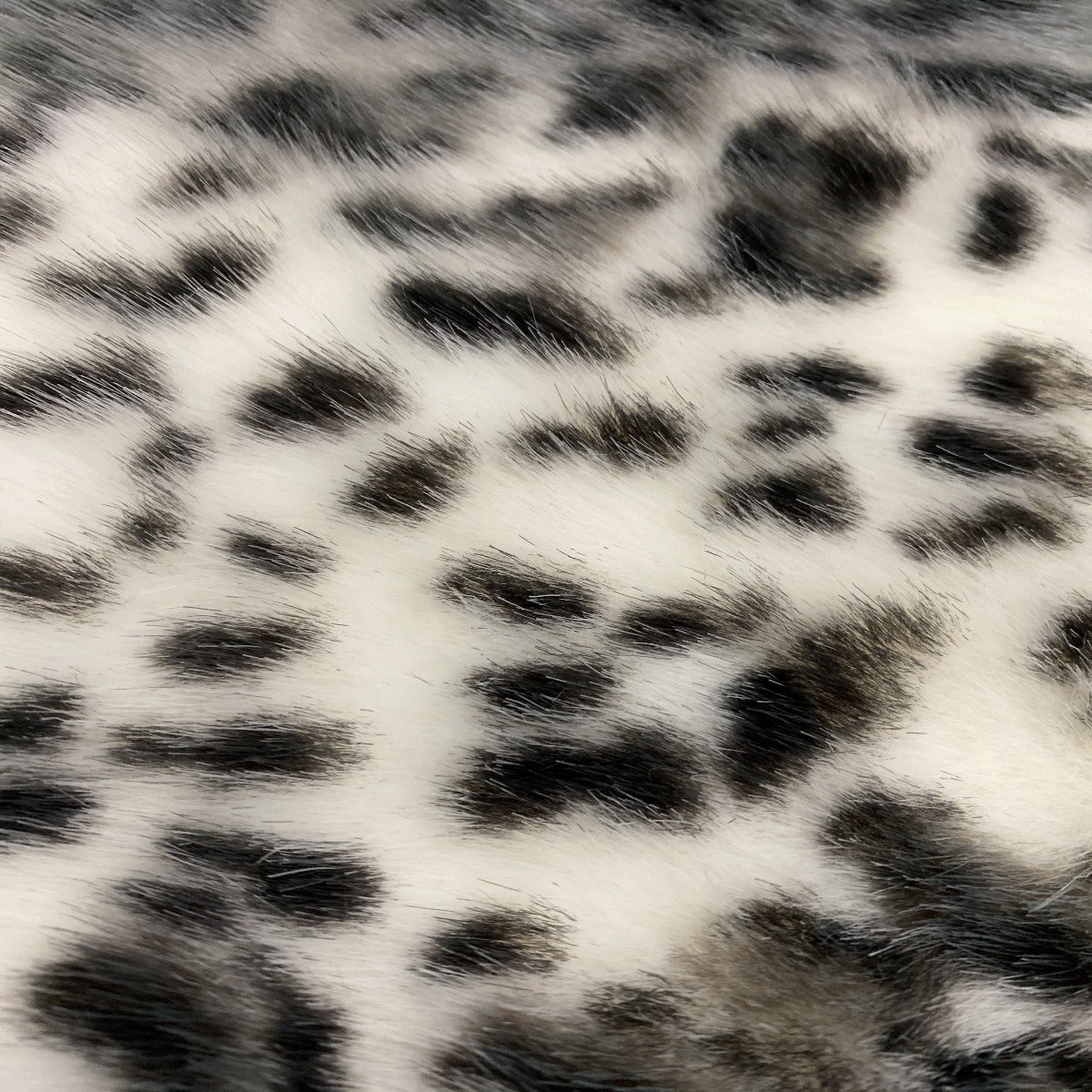 Gray Snow Leopard Tissavel Faux Fur Fabric - Fashion Fabrics Los Angeles