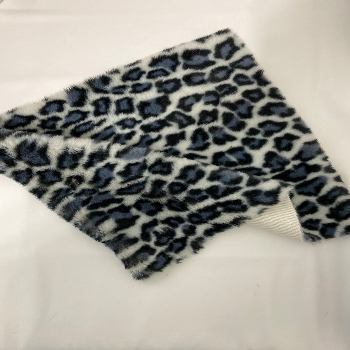 Ice Gray Minky Leopard Faux Fur Fabric - Fashion Fabrics Los Angeles