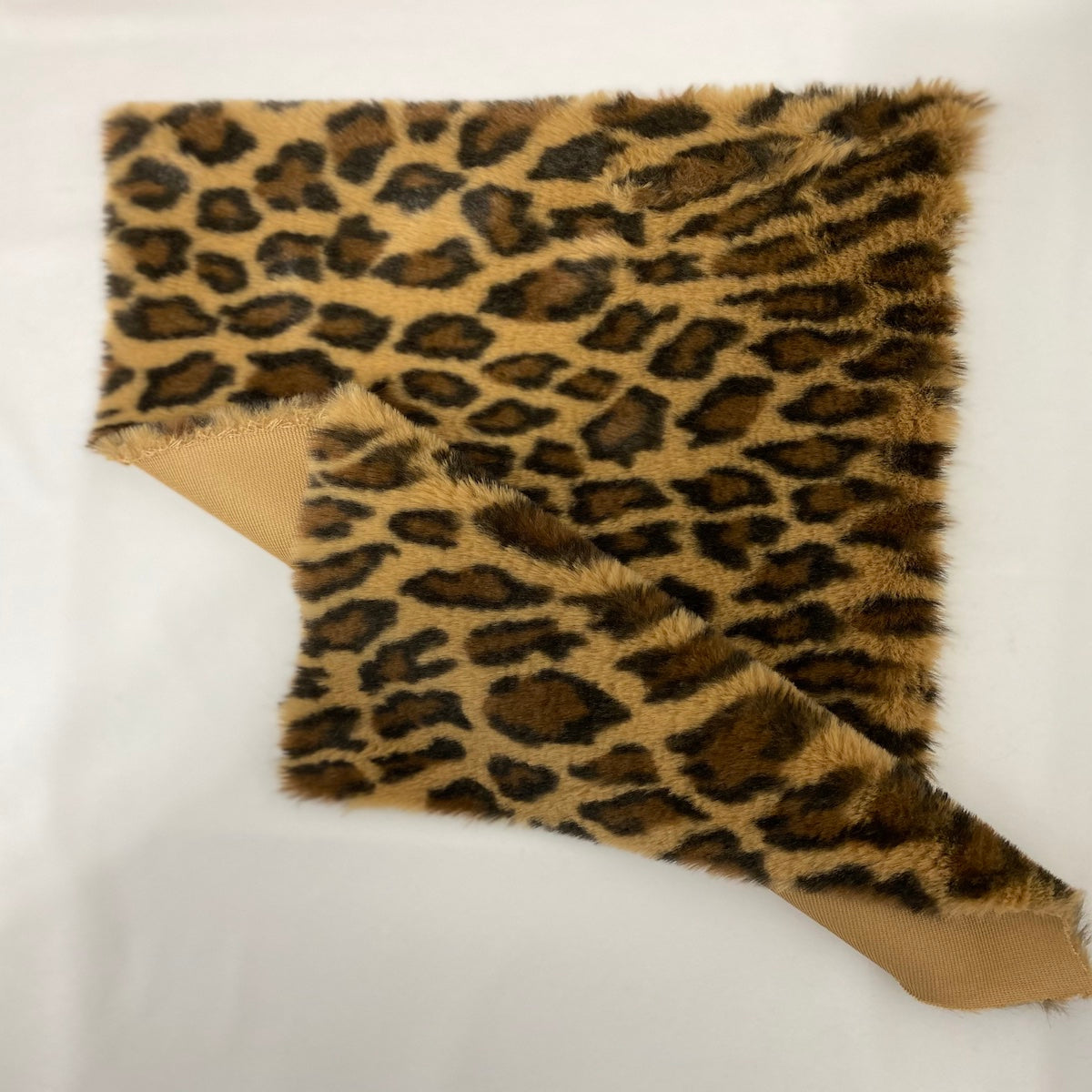 Brown Minky Leopard Faux Fur Fabric - Fashion Fabrics Los Angeles