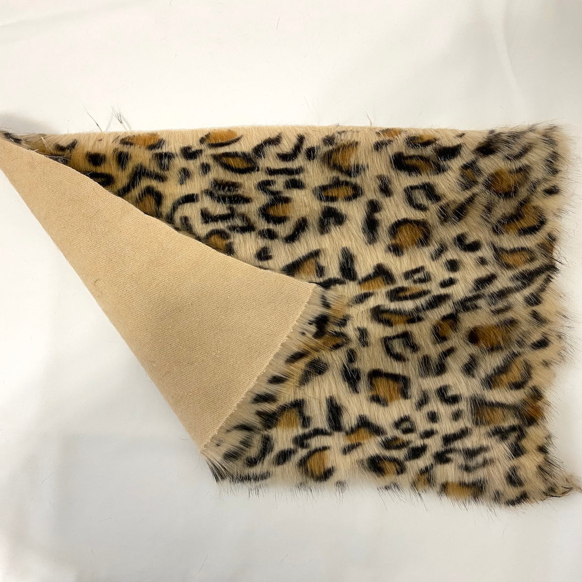 Gold Leopard Print Faux Fur Fabric - Fashion Fabrics Los Angeles