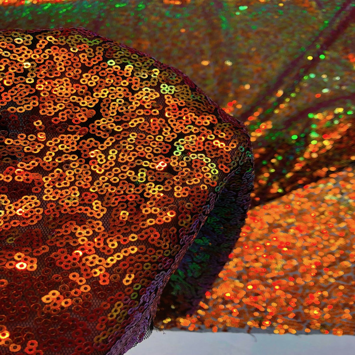 Orange Iridescent All Over Sequins Fabric - Fashion Fabrics LLC