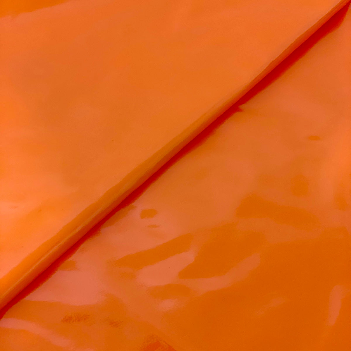 Orange Faux Patent Leather Apparel Vinyl Fabric - Fashion Fabrics LLC