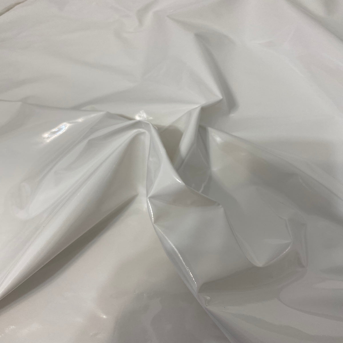 White Faux Patent Leather Apparel Vinyl Fabric - Fashion Fabrics LLC