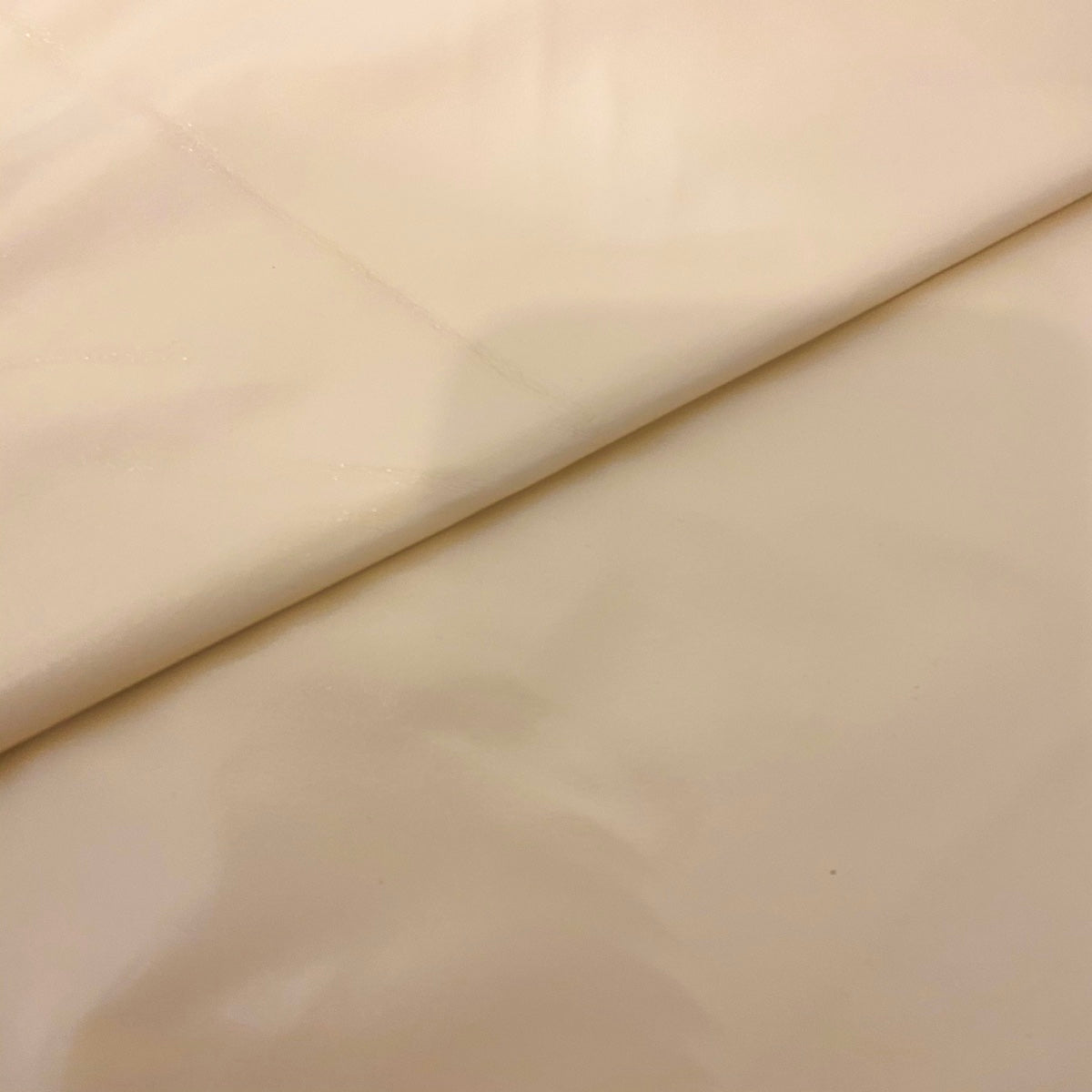 Beige Faux Patent Leather Apparel Vinyl Fabric - Fashion Fabrics LLC