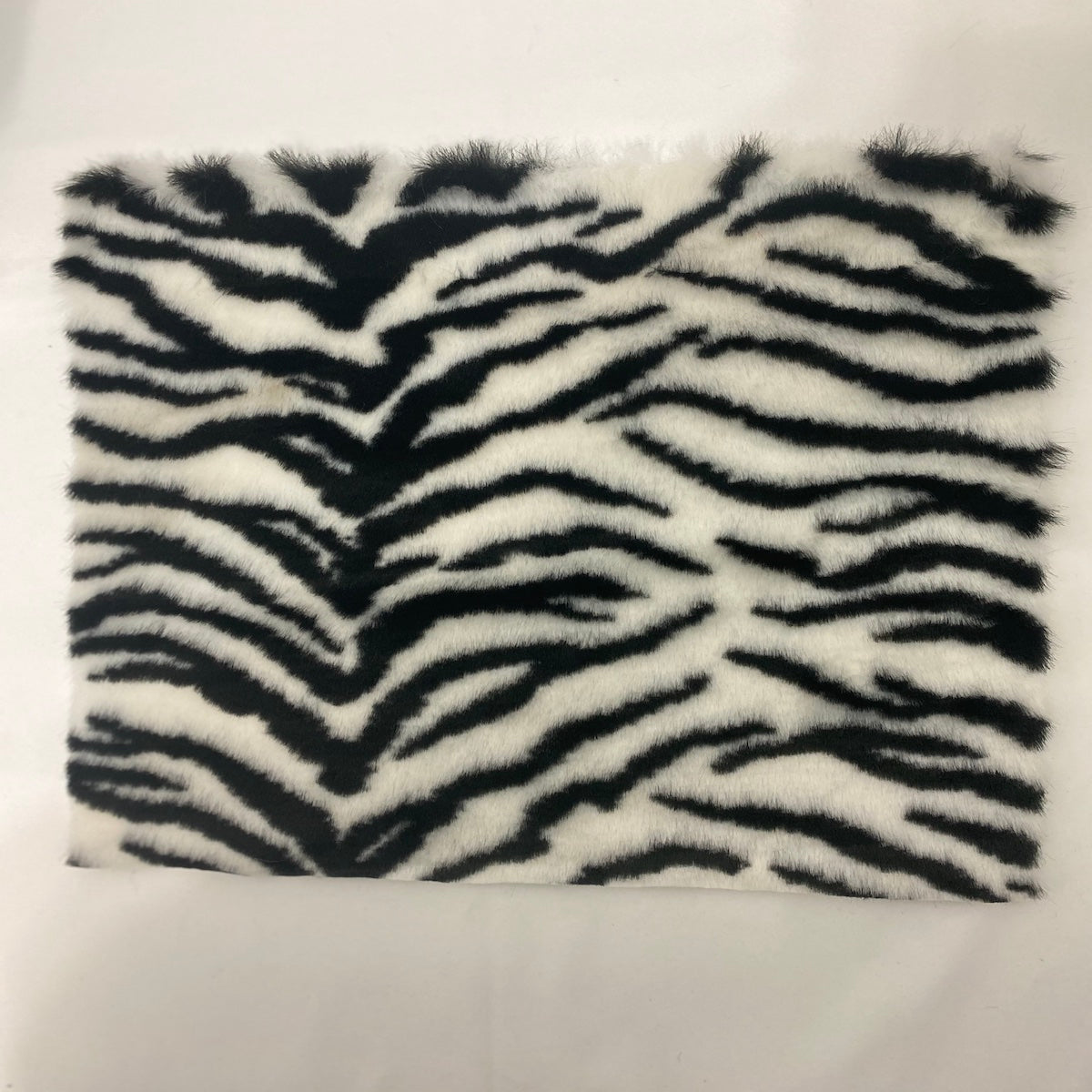 White Black Tiger Luxe Plush Faux Fur Fabric - Fashion Fabrics LLC