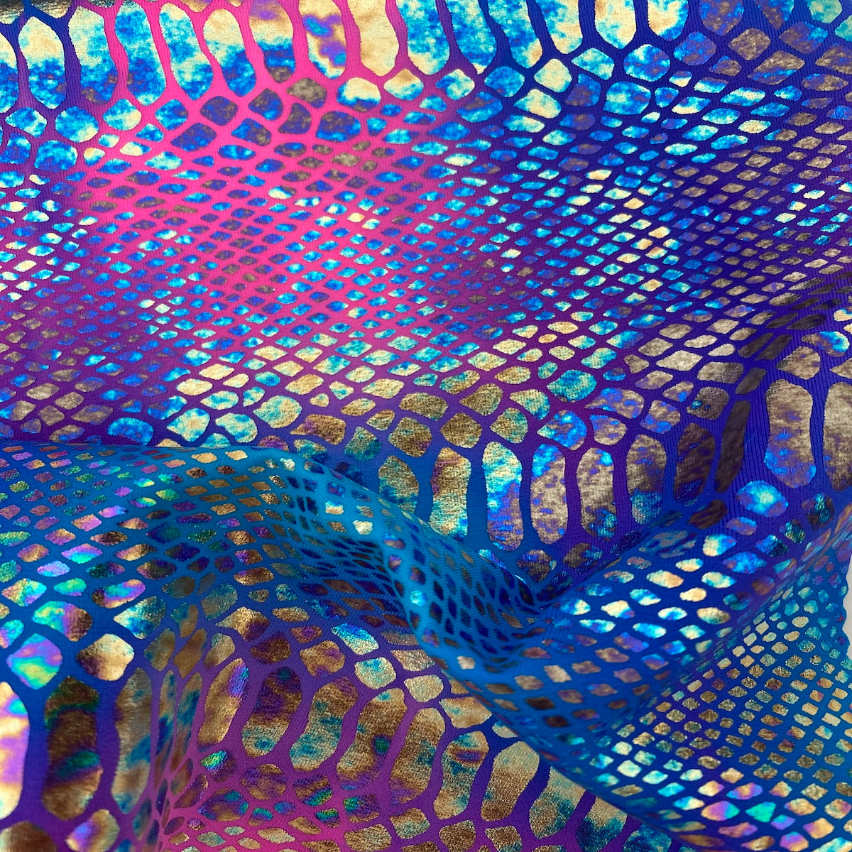 Pink | Blue Holographic Tie Dye Taipan Snakeskin Nylon Spandex Fabric - Fashion Fabrics LLC