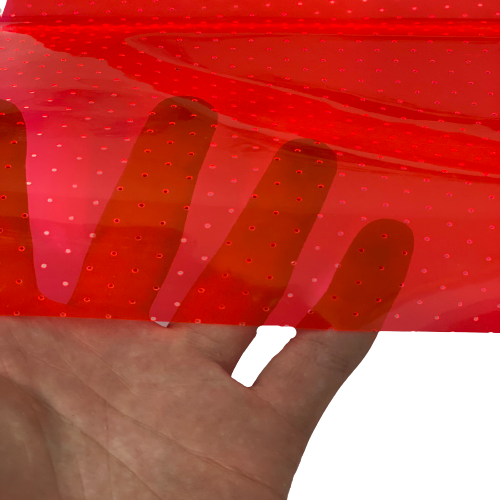 Red Perforated Tinted PVC Marine Clear Vinyl Fabric - Fashion Fabrics LLC