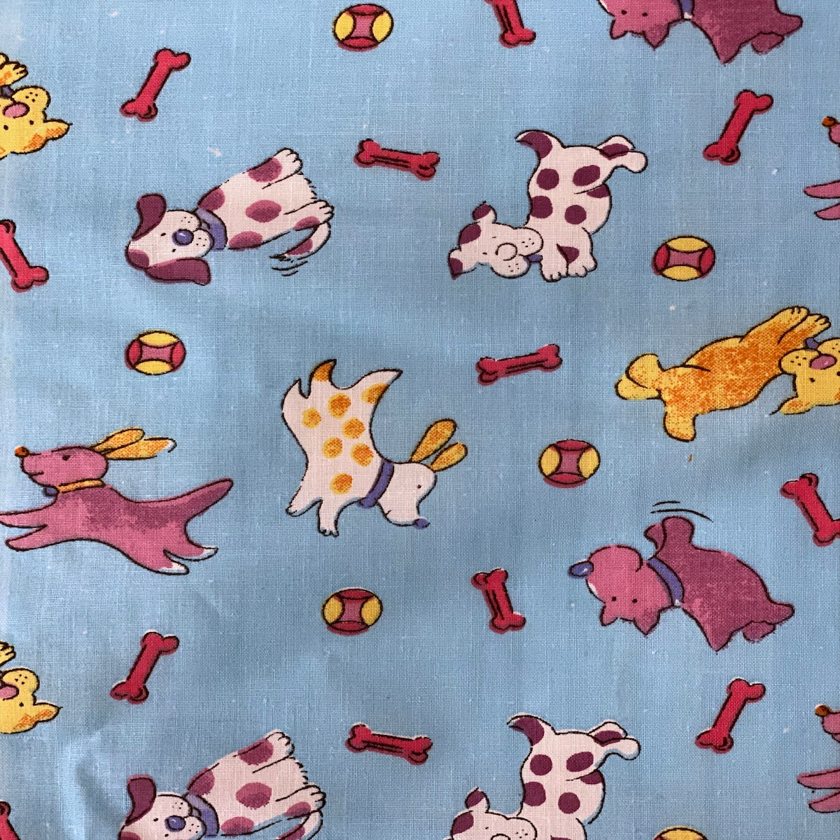 Baby Blue Puppy Bone Print Poly Cotton Fabric - Fashion Fabrics LLC