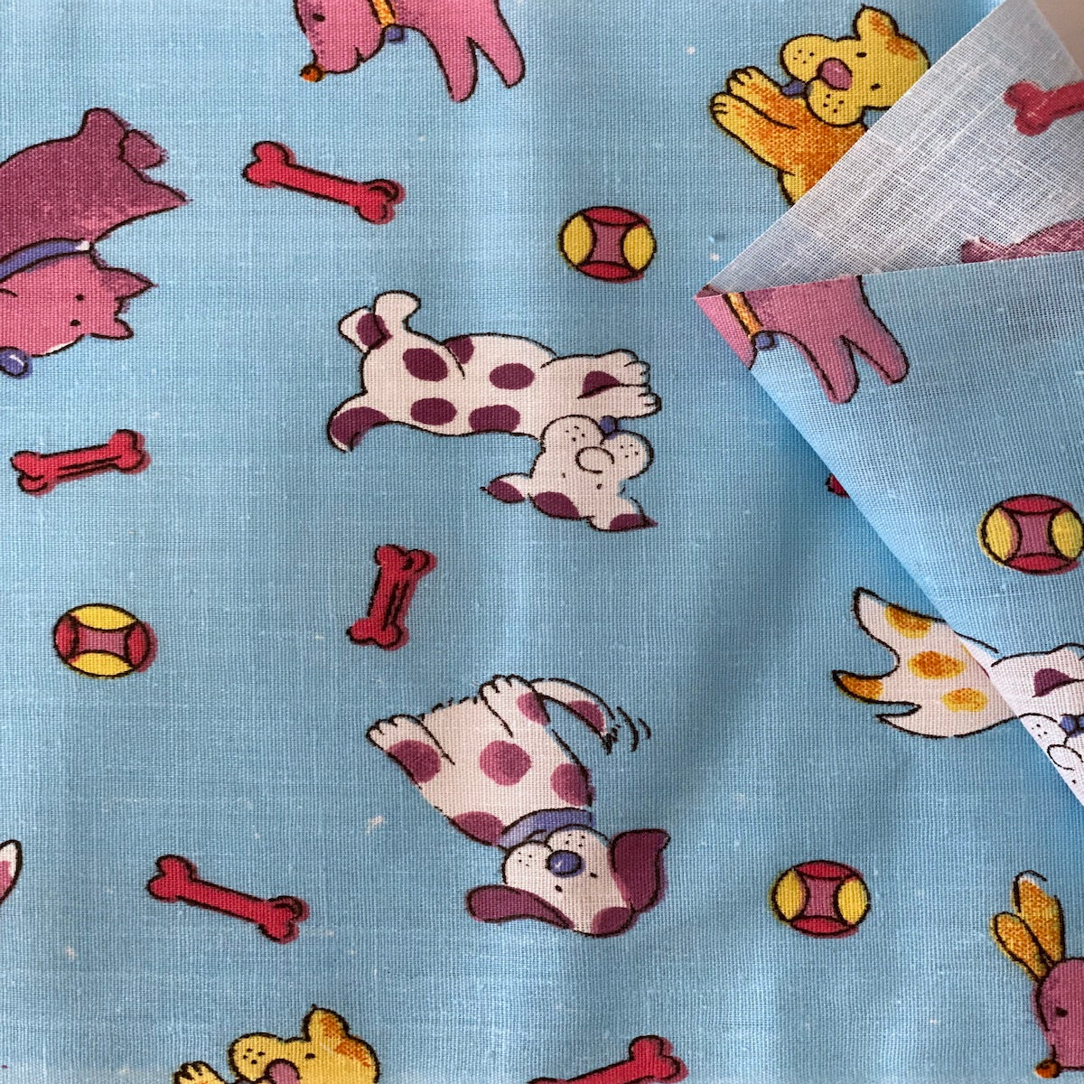 Baby Blue Puppy Bone Print Poly Cotton Fabric - Fashion Fabrics LLC