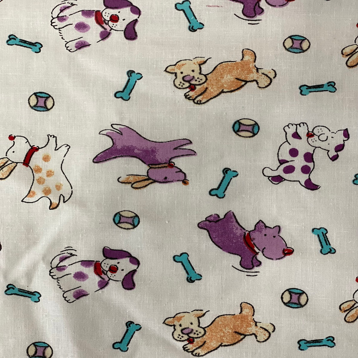 White | Purple Puppy Bone Print Poly Cotton Fabric - Fashion Fabrics LLC