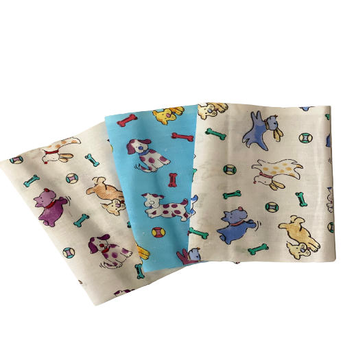 White | Blue Puppy Bone Print Poly Cotton Fabric - Fashion Fabrics LLC