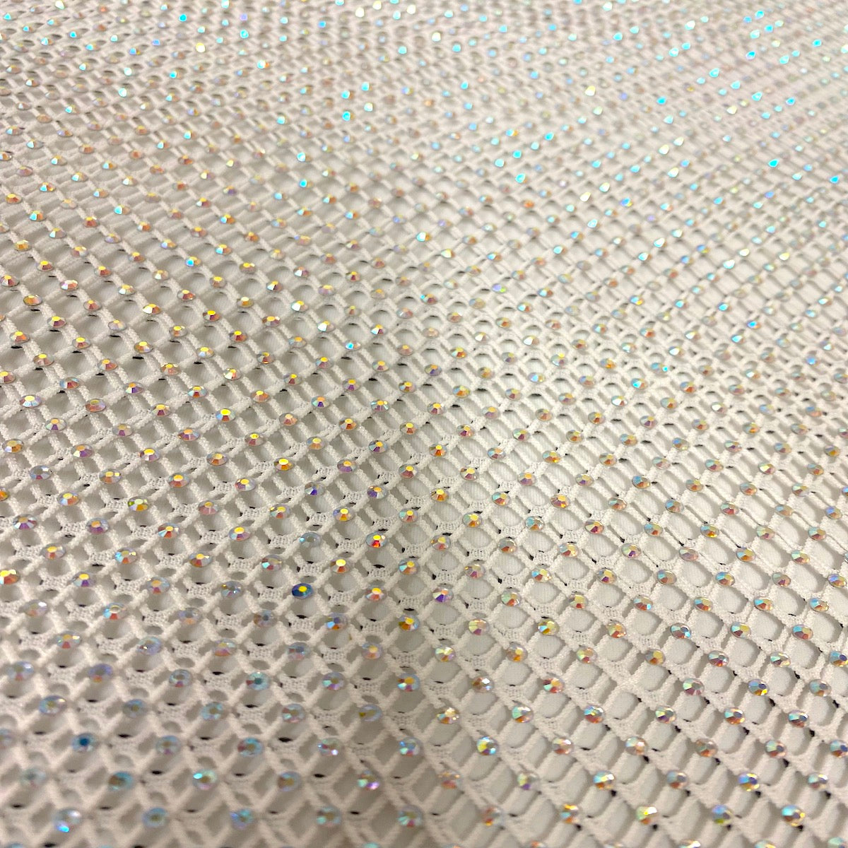 White Serene Iridescent Rhinestone Fishnet Lace Fabric - Fashion Fabrics LLC