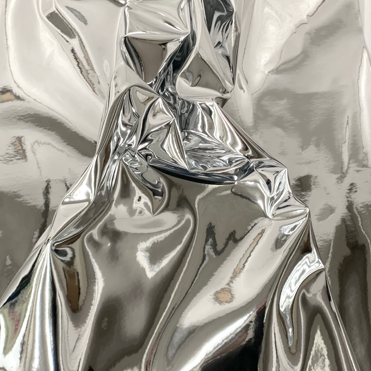 SIlver Chrome Reflective Mirror Vinyl Fabric - Fashion Fabrics LLC