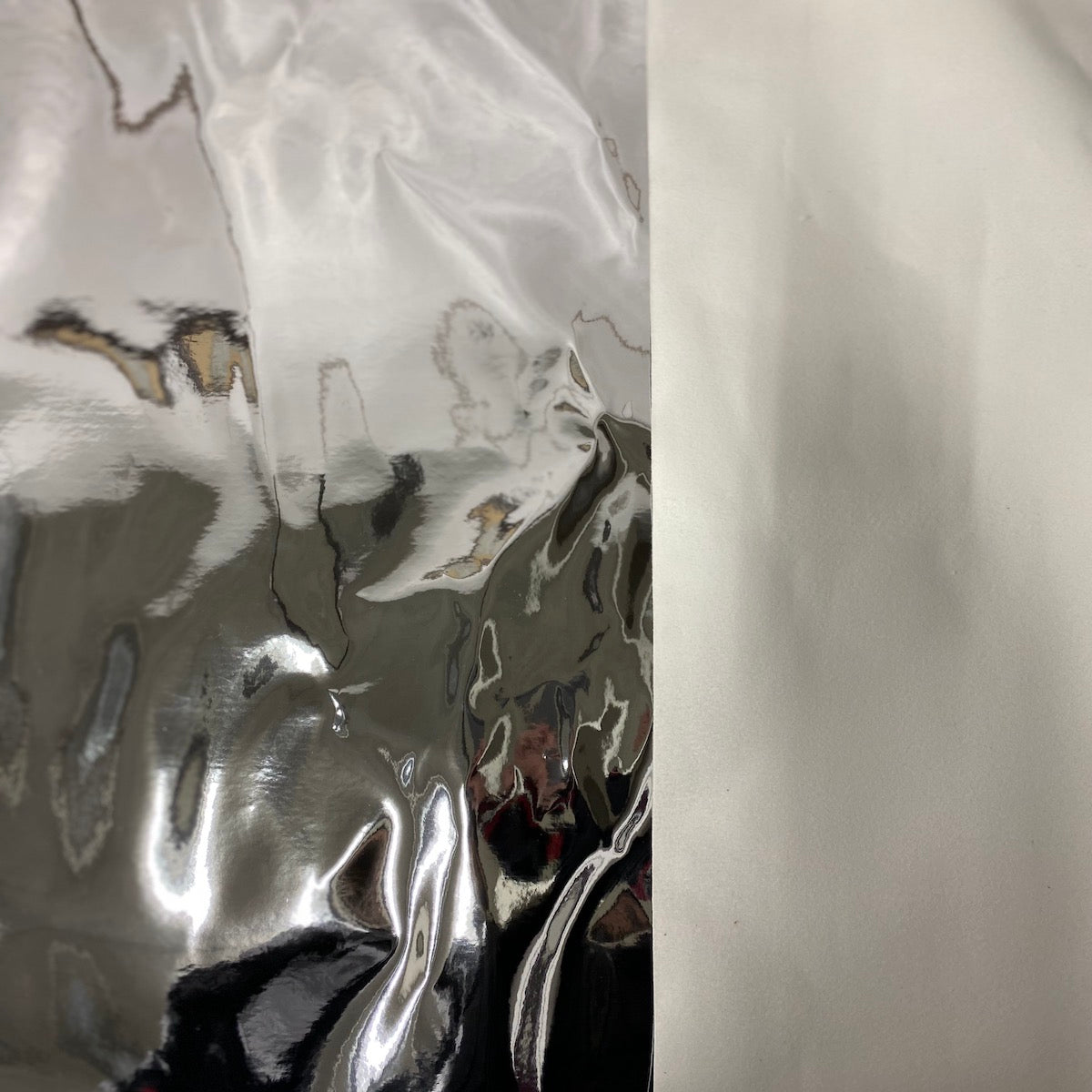 SIlver Chrome Reflective Mirror Vinyl Fabric - Fashion Fabrics LLC