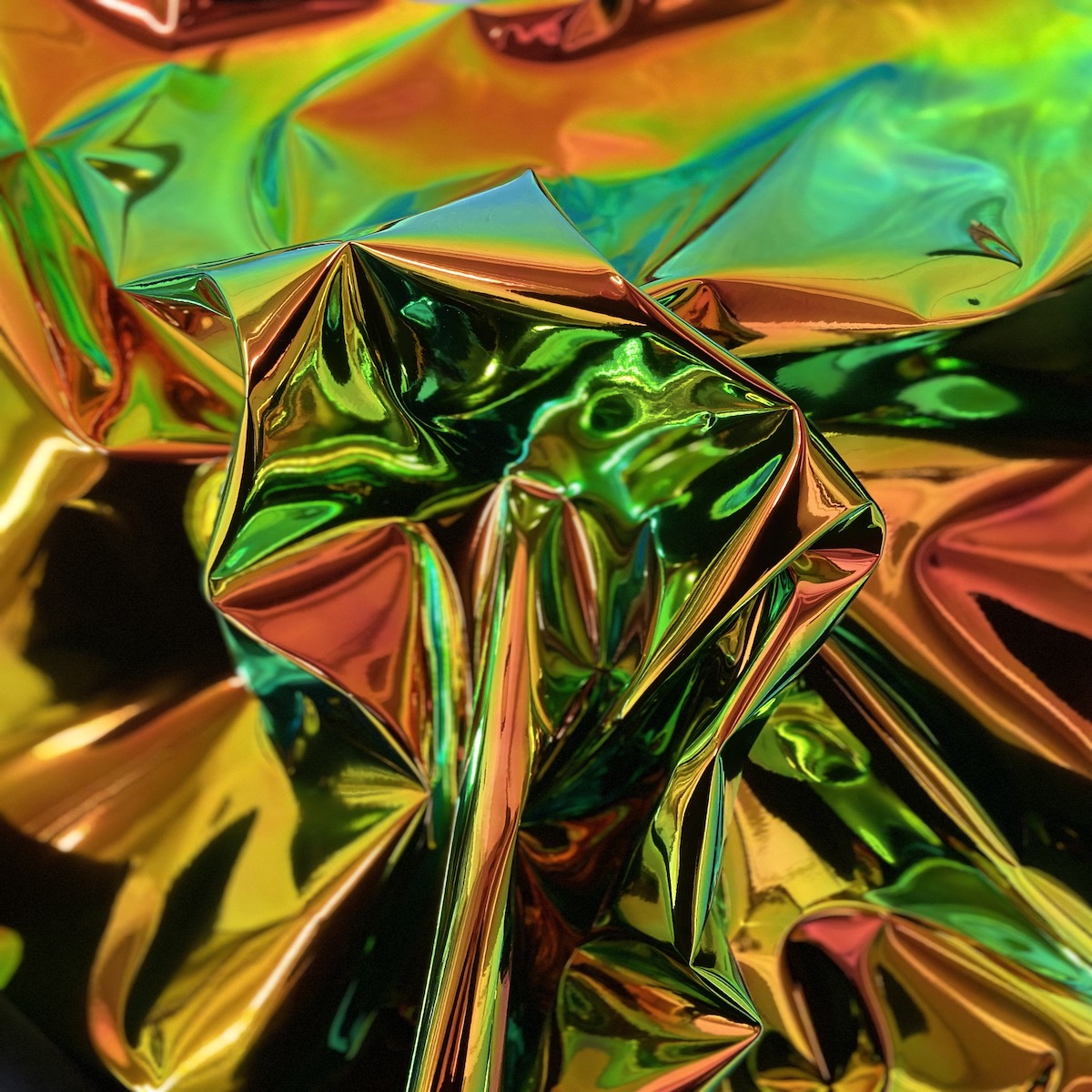 Orange Iridescent Chrome Reflective Mirror Vinyl Fabric - Fashion Fabrics LLC