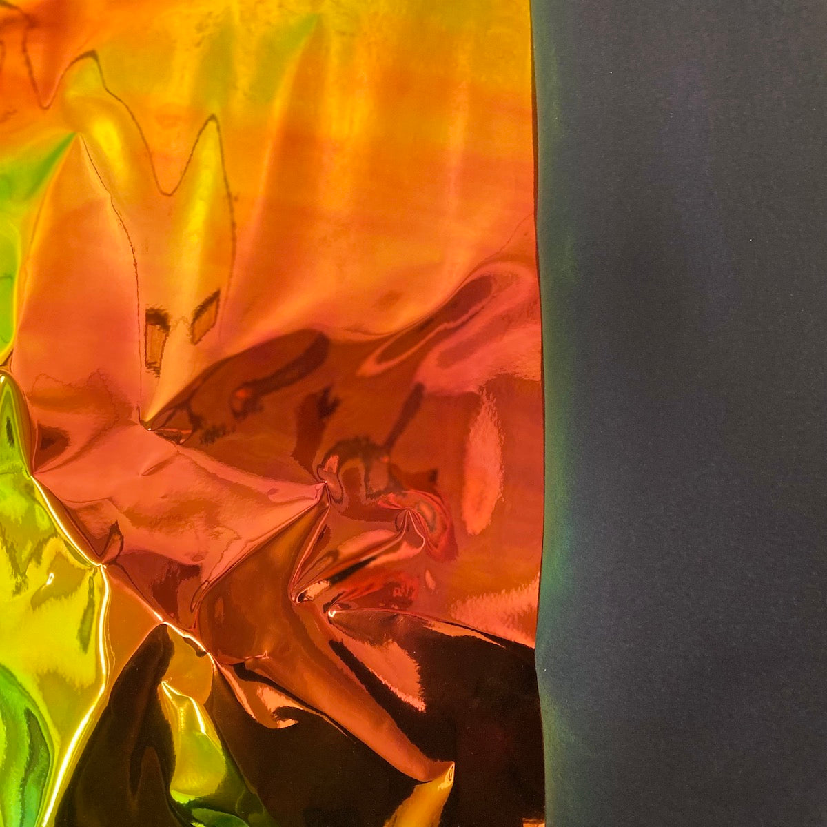 Orange Iridescent Chrome Reflective Mirror Vinyl Fabric - Fashion Fabrics LLC