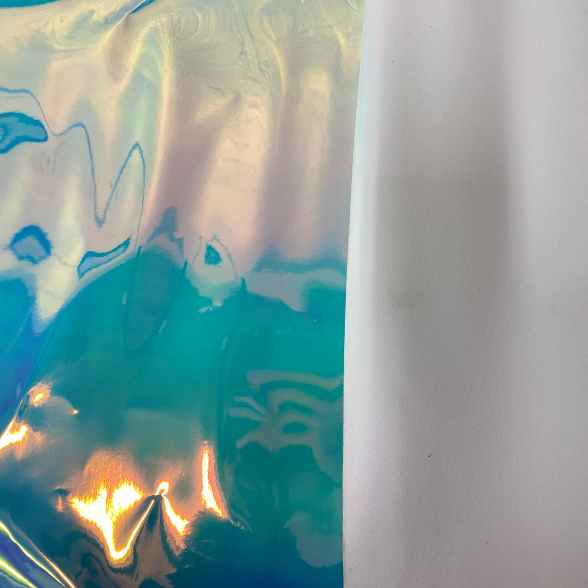 Pearl Blue Iridescent Chrome Reflective Mirror Vinyl Fabric - Fashion Fabrics LLC