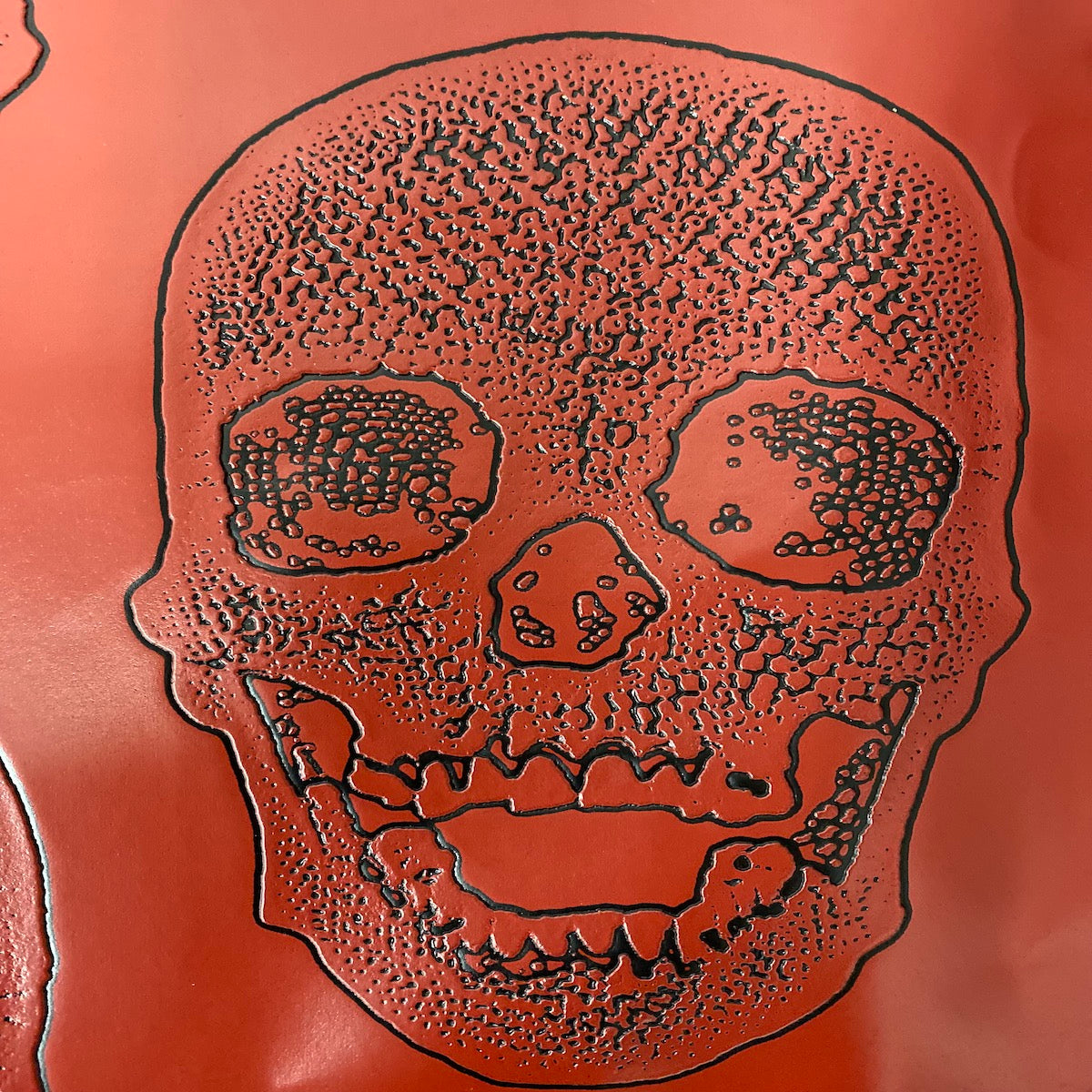Red Skeleton Skull Vinyl Fabric - Fashion Fabrics LLC
