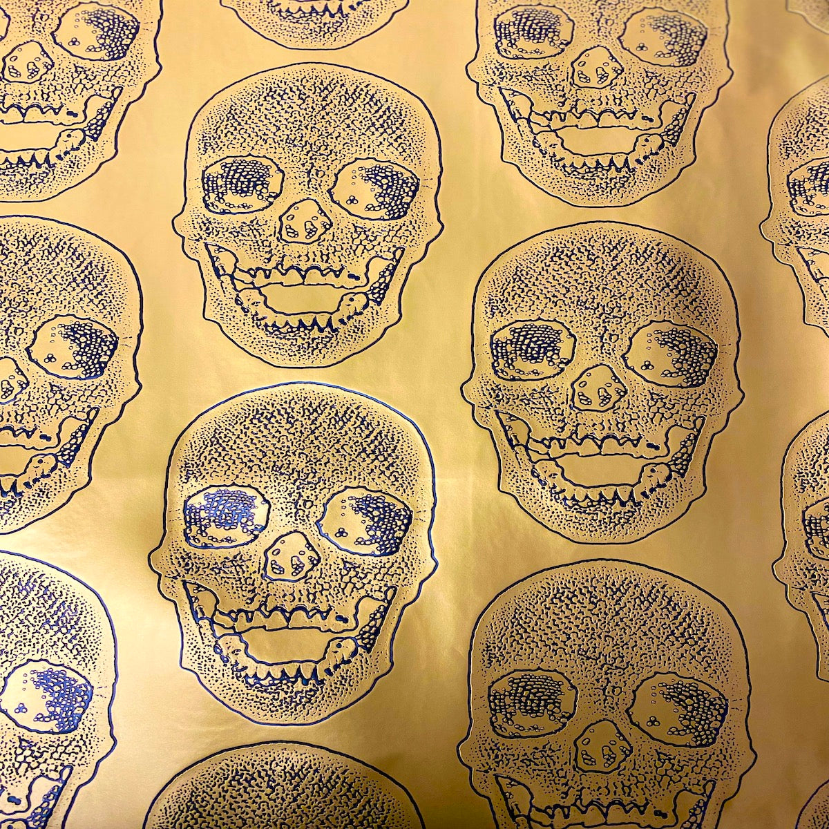 Gold Skeleton Skull Vinyl Fabric - Fashion Fabrics LLC