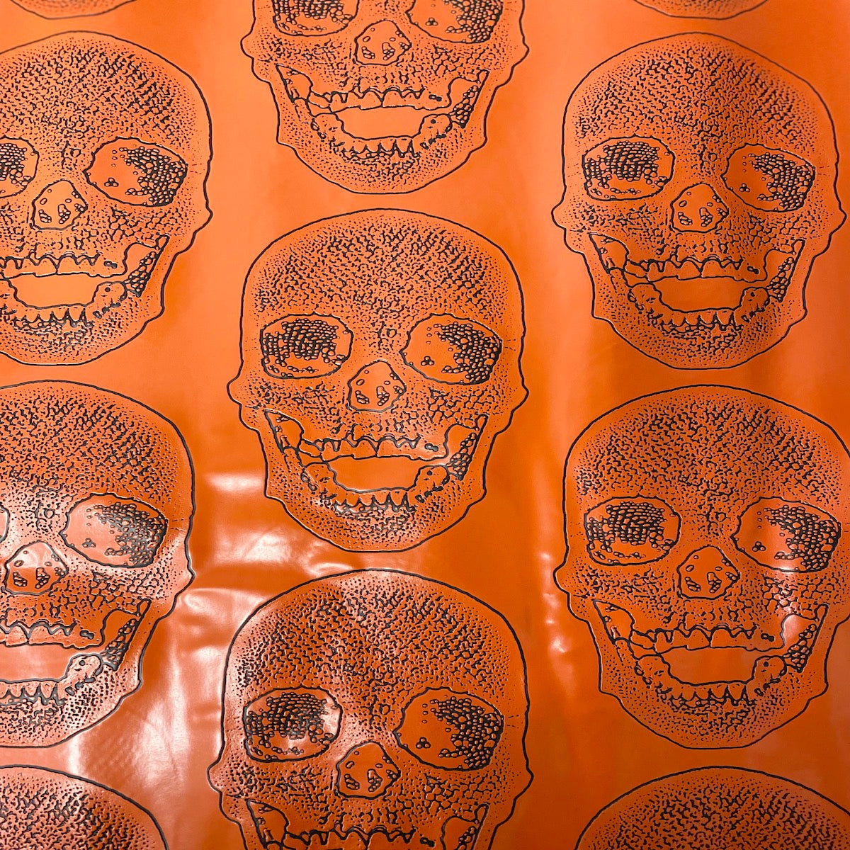 Orange Skeleton Skull Vinyl Fabric - Fashion Fabrics LLC