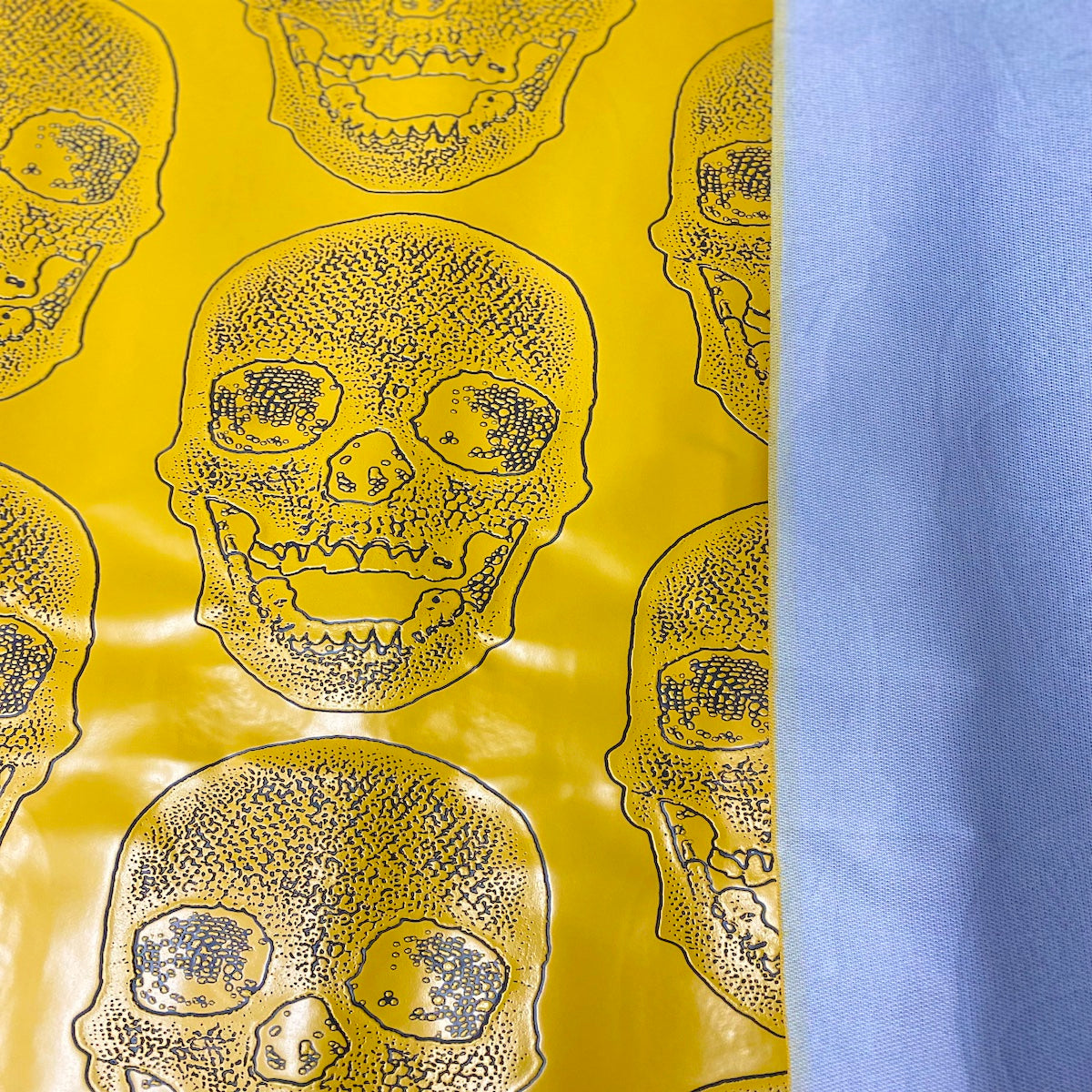 Yellow Skeleton Skull Vinyl Fabric - Fashion Fabrics LLC