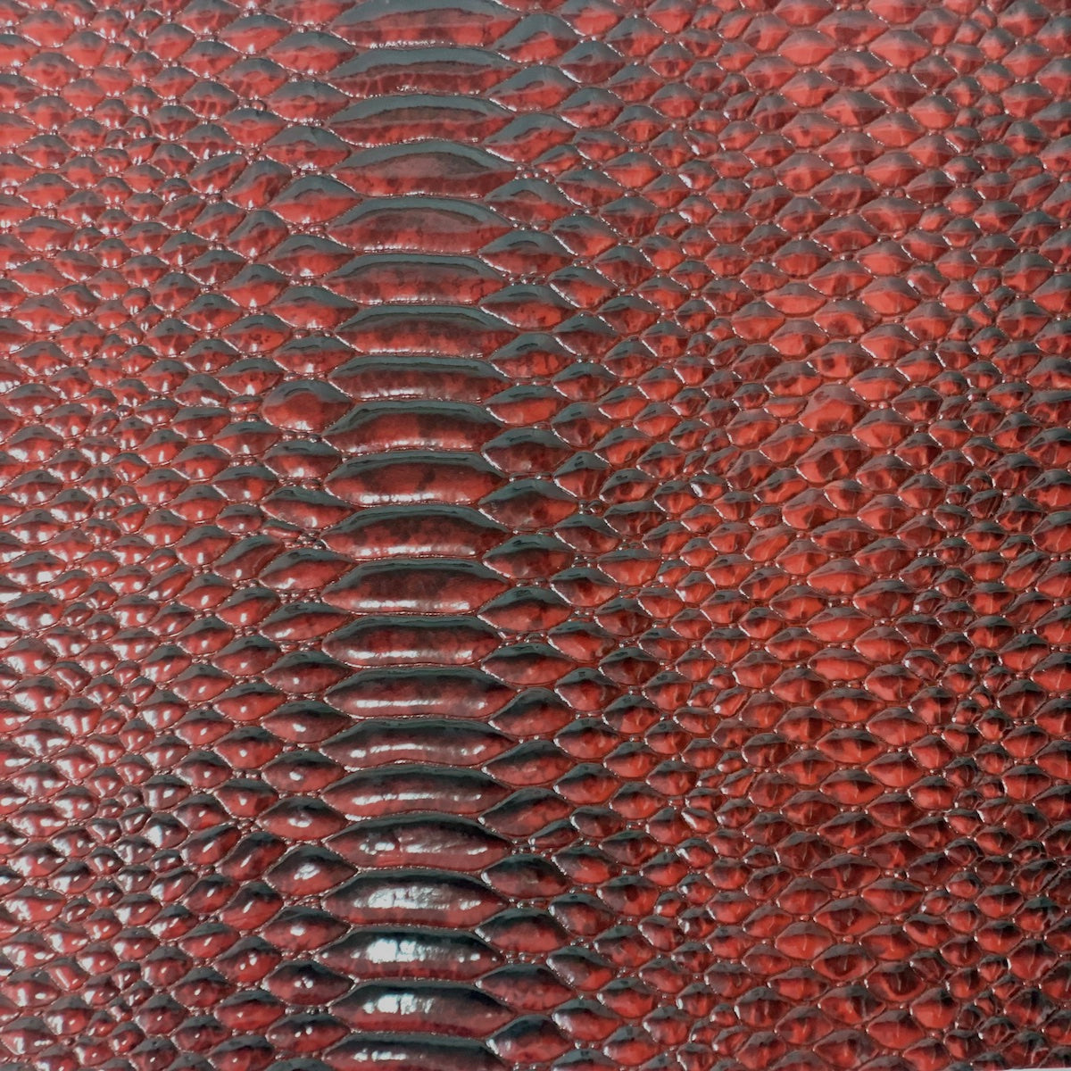 Dark Red Culebra Patent 3D Embossed Snakeskin Vinyl Fabric - Fashion Fabrics LLC