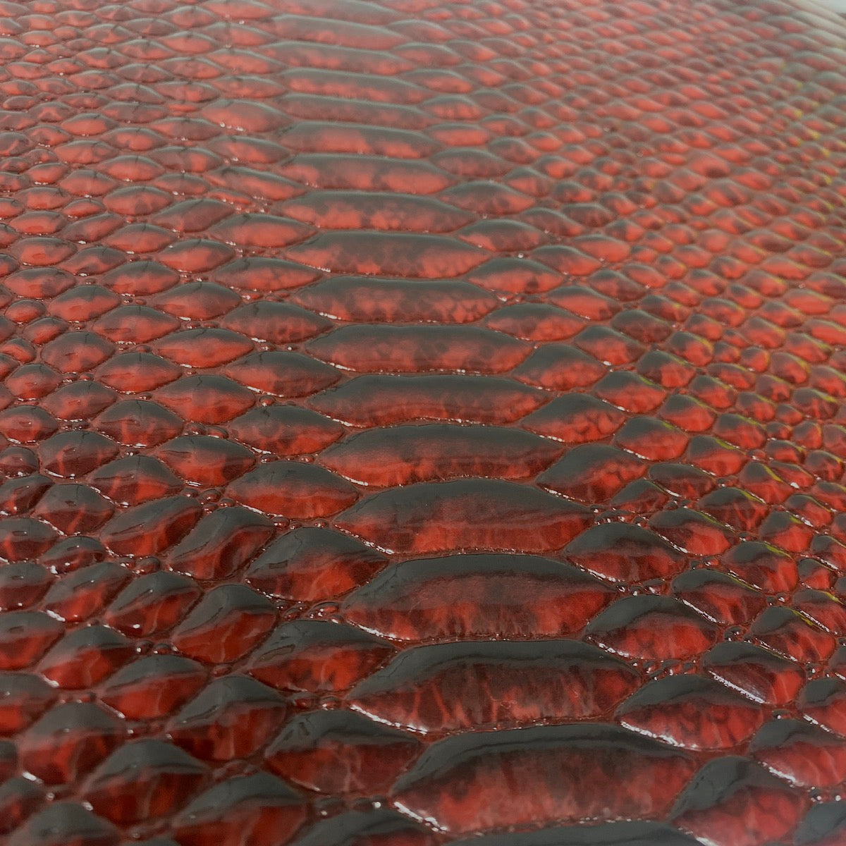 Dark Red Culebra Patent 3D Embossed Snakeskin Vinyl Fabric - Fashion Fabrics LLC