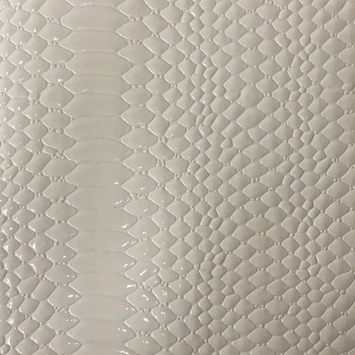 Ivory Culebra Patent 3D Embossed Snakeskin Vinyl Fabric - Fashion Fabrics LLC