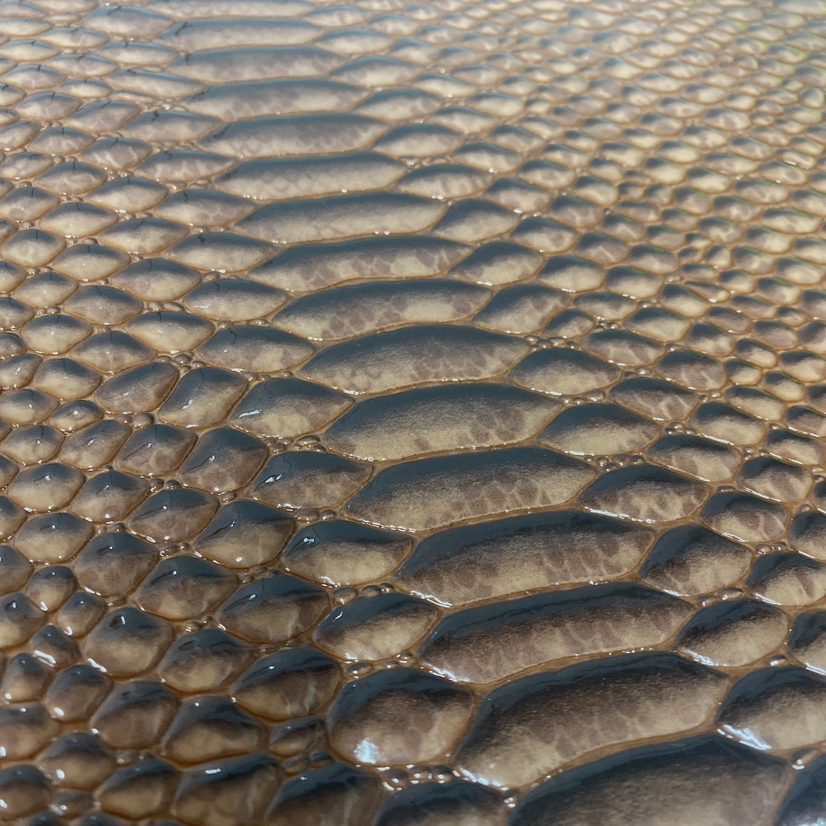 Mocha Brown Culebra Patent 3D Embossed Snakeskin Vinyl Fabric - Fashion Fabrics LLC
