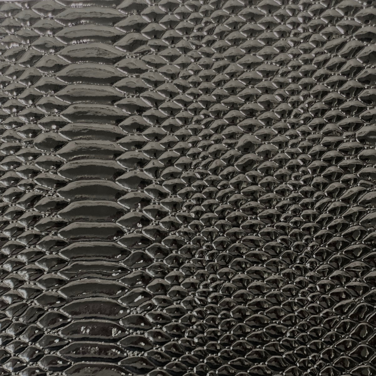 Black Culebra Patent 3D Embossed Snakeskin Vinyl Fabric - Fashion Fabrics LLC