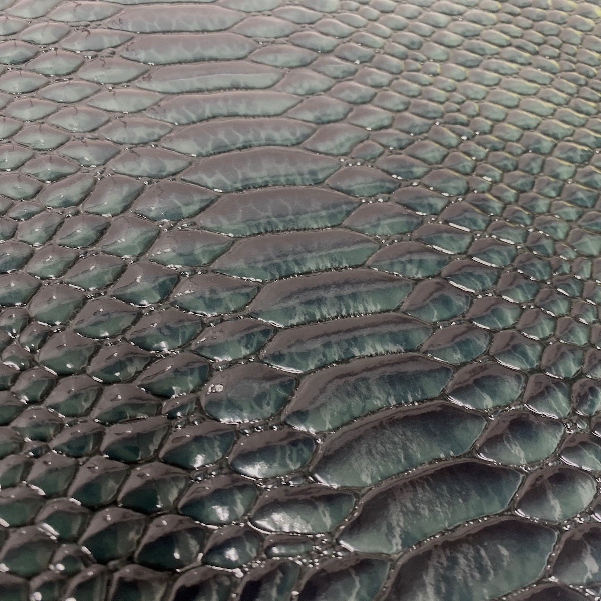 Hunter Green Culebra Patent 3D Embossed Snakeskin Vinyl Fabric - Fashion Fabrics LLC