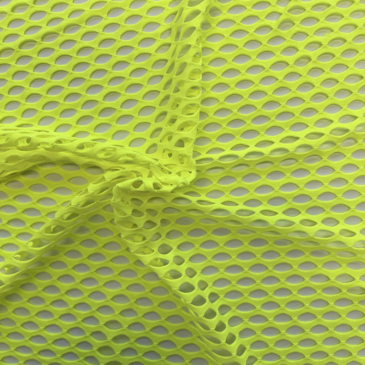 Neon Yellow Crochet Fishnet Netting Spandex Fabric - Fashion Fabrics LLC