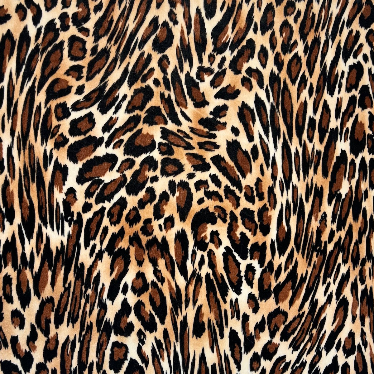 Snow Leopard Print Stretch Velvet Fabric - Fashion Fabrics LLC