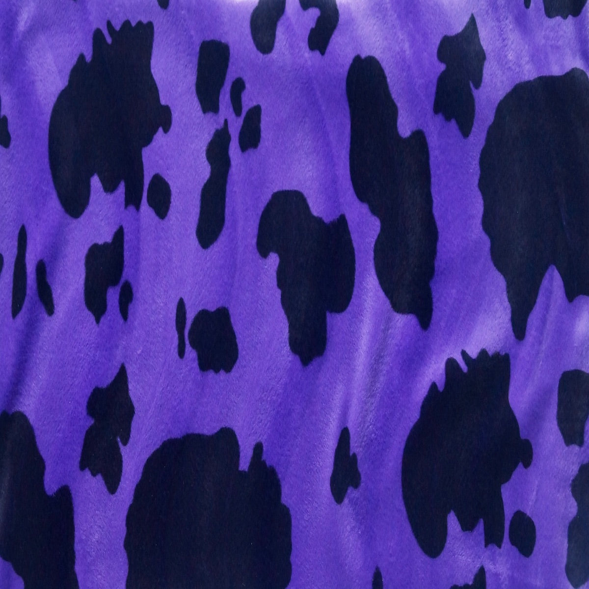 Black Purple Cow Velboa Faux Fur - Fashion Fabrics Los Angeles
