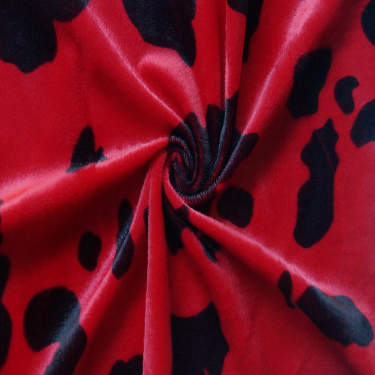 Black Red Cow Velboa Faux Fur - Fashion Fabrics Los Angeles