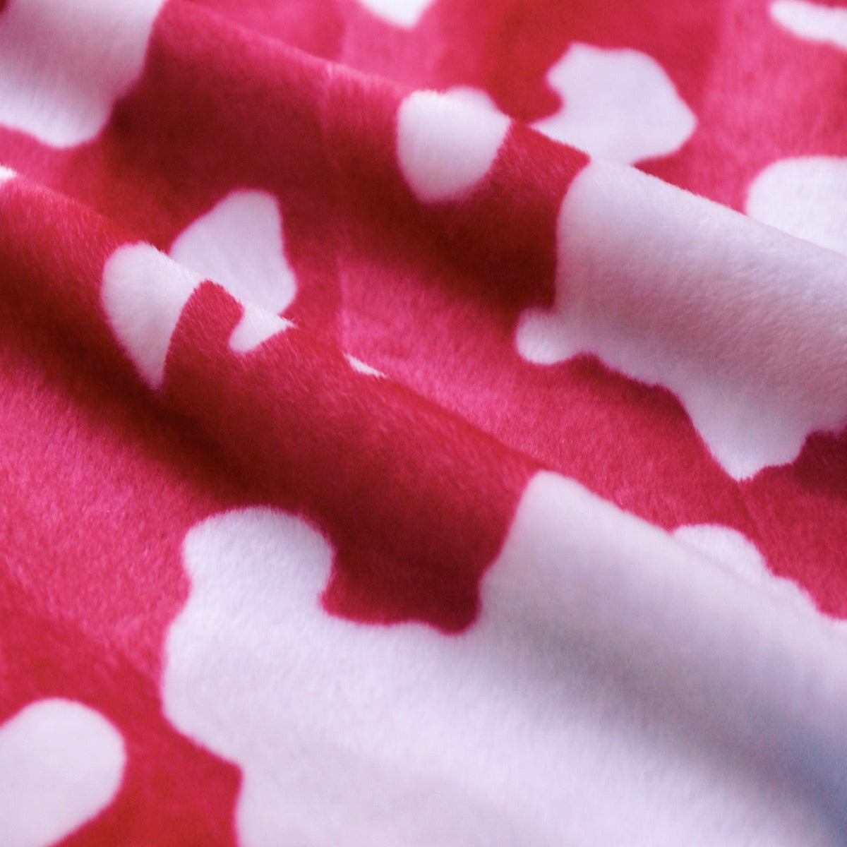 Red White Cow Velboa Faux Fur - Fashion Fabrics Los Angeles