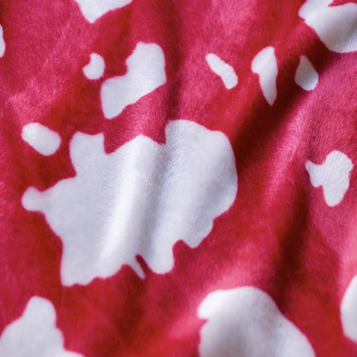 Red White Cow Velboa Faux Fur - Fashion Fabrics Los Angeles