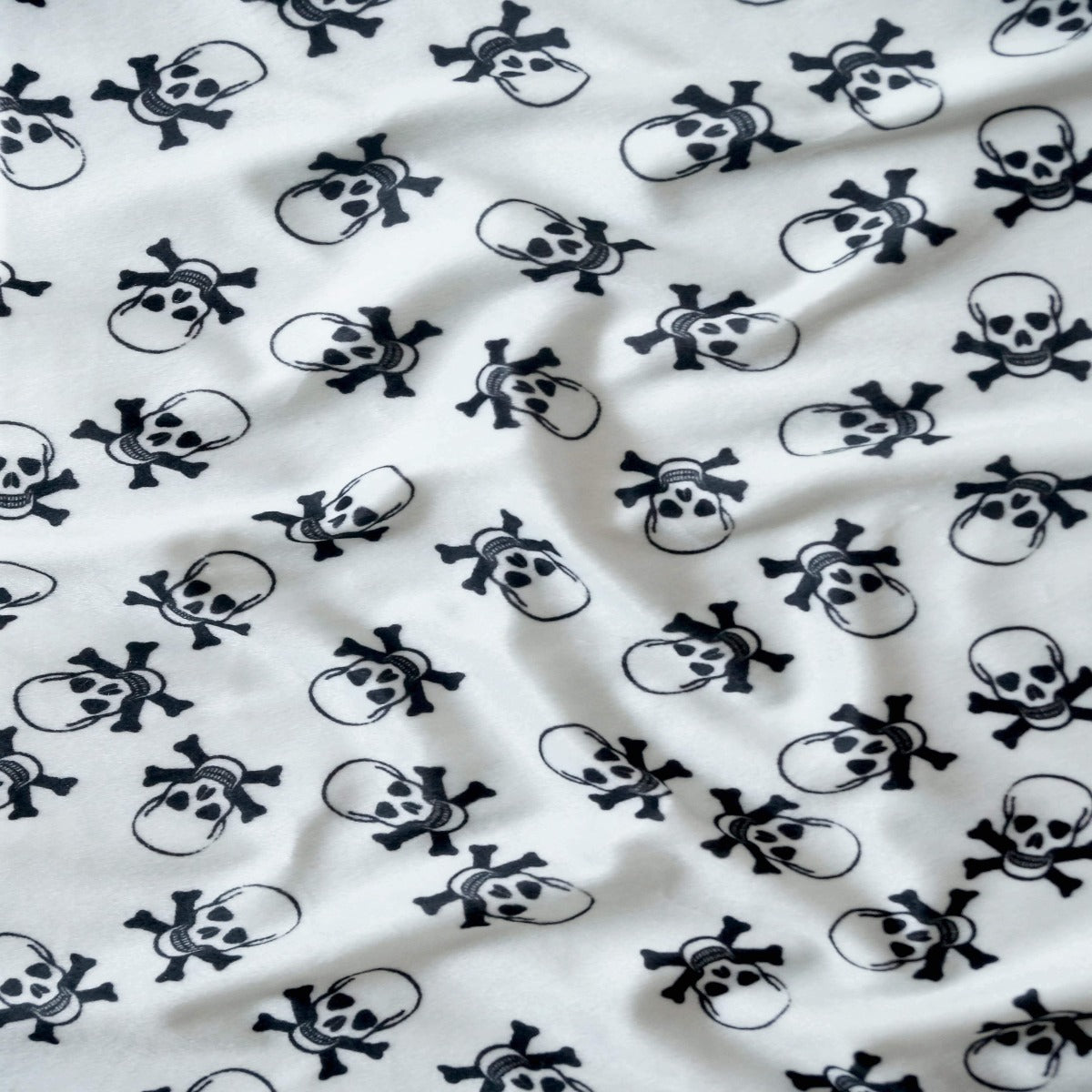 White Velboa Skull Print Faux Fur Fabric - Fashion Fabrics Los Angeles