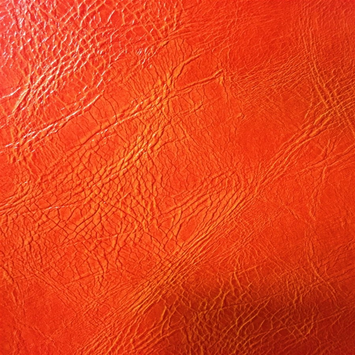 Orange Distressed Faux Leather Fabric - Fashion Fabrics Los Angeles