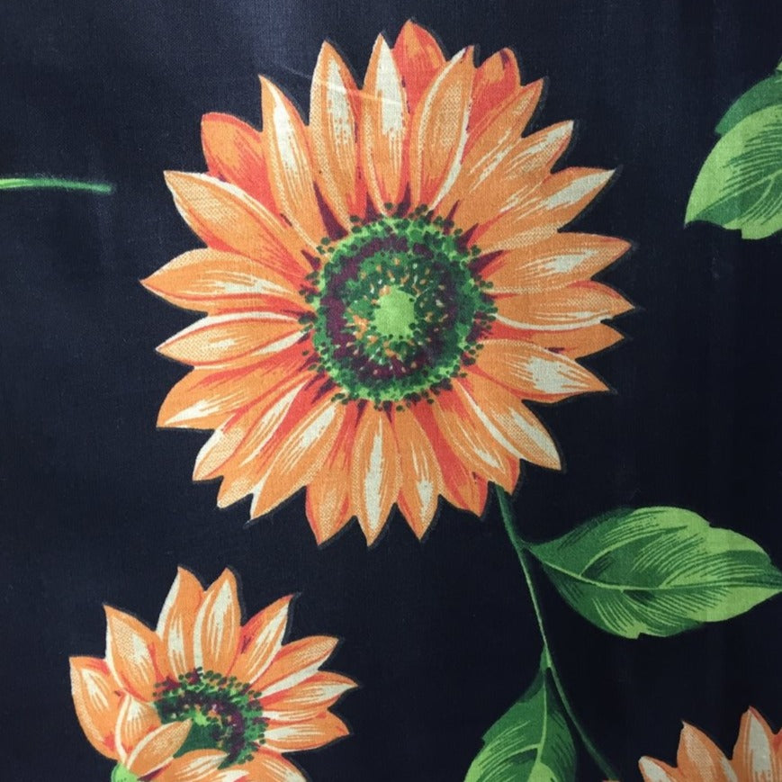 Black Daisy Poly Cotton Fabric - Fashion Fabrics Los Angeles