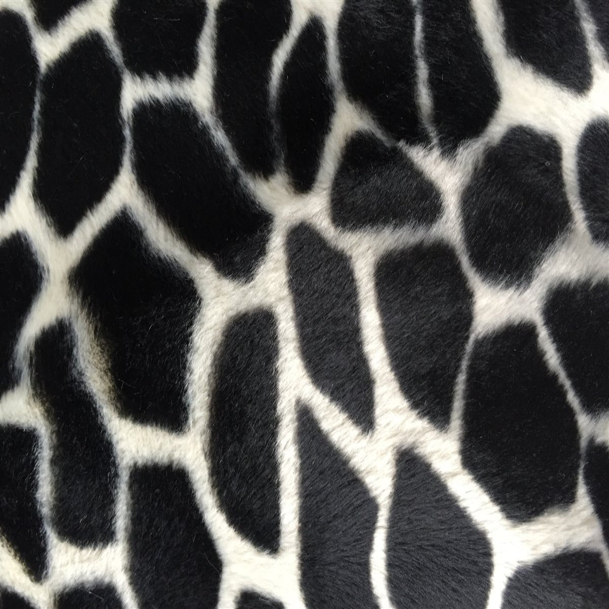 Black Giraffe Velboa Faux Fur - Fashion Fabrics Los Angeles