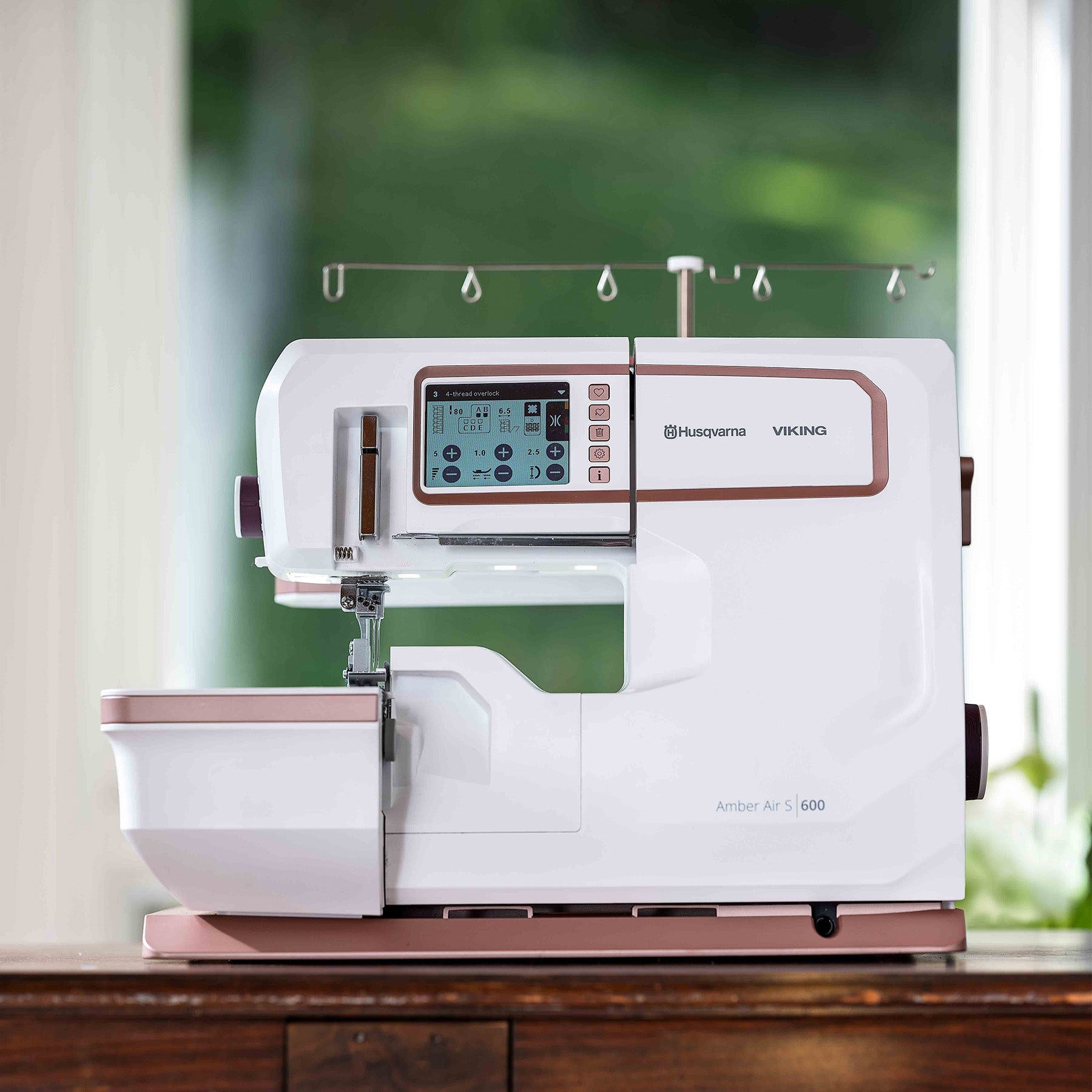 HUSQVARNA® VIKING® AMBER™ Air S | 600 Coverlock Machine - Fashion Fabrics LLC