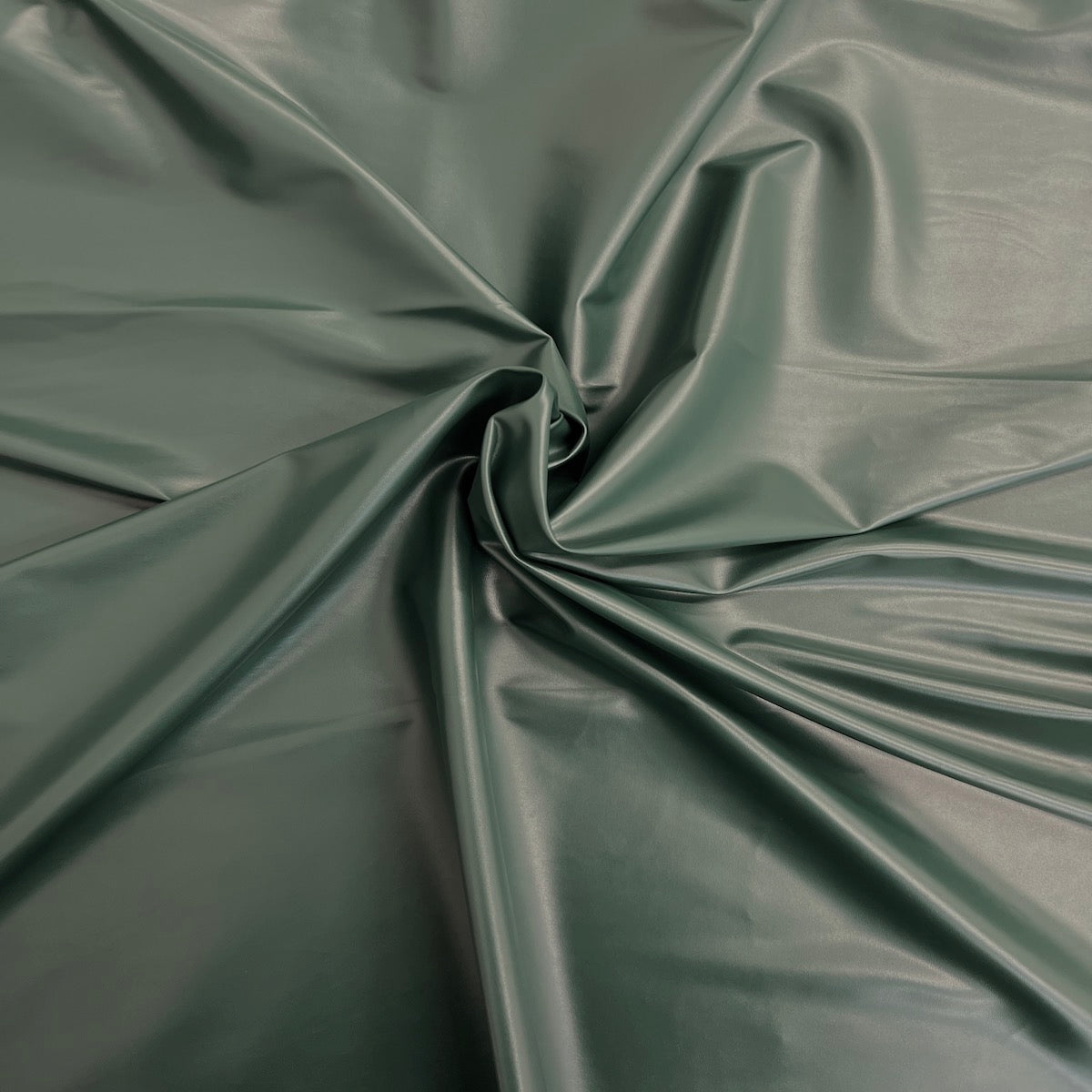 Tela de vinilo de cuero sintético elástico bidireccional verde cazador 